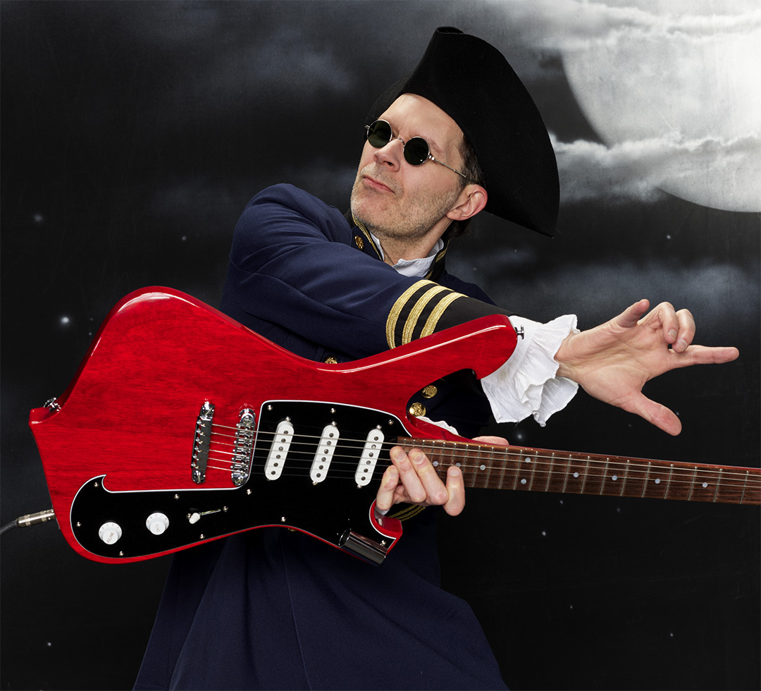 Paul Gilbert and his Ibanez Fireman loaded with DiMarzio Injector pickups