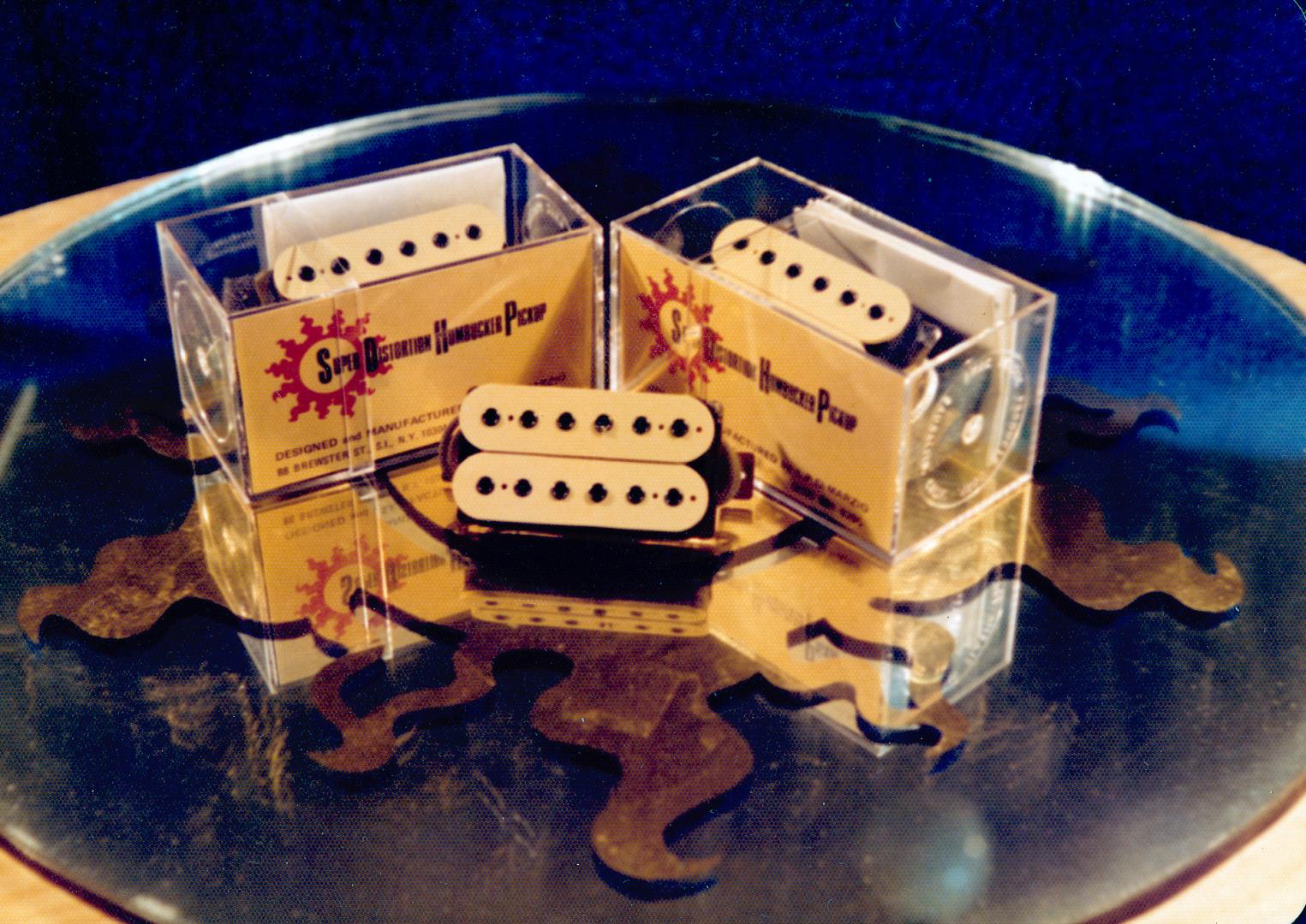 The original Pat Decicco mirror and the original packaging design.