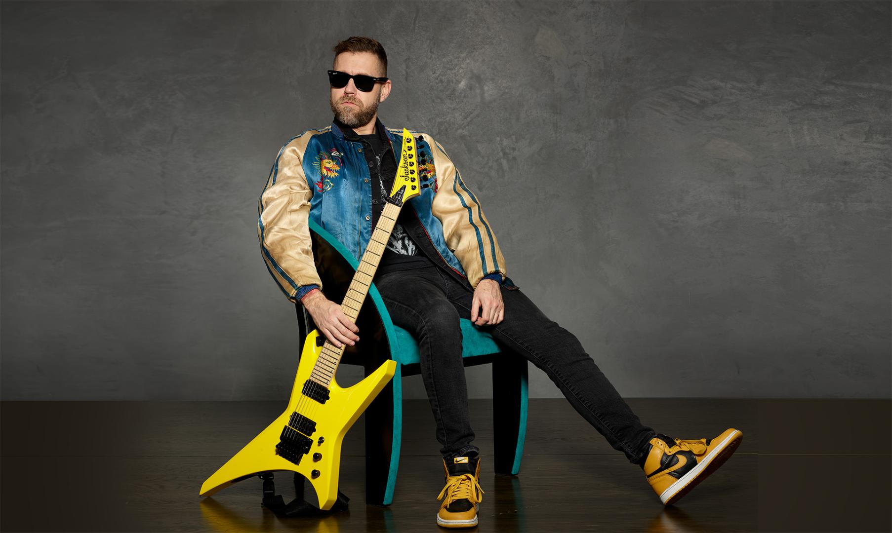Dave Davidson with his signature yellow Jackson Warrior