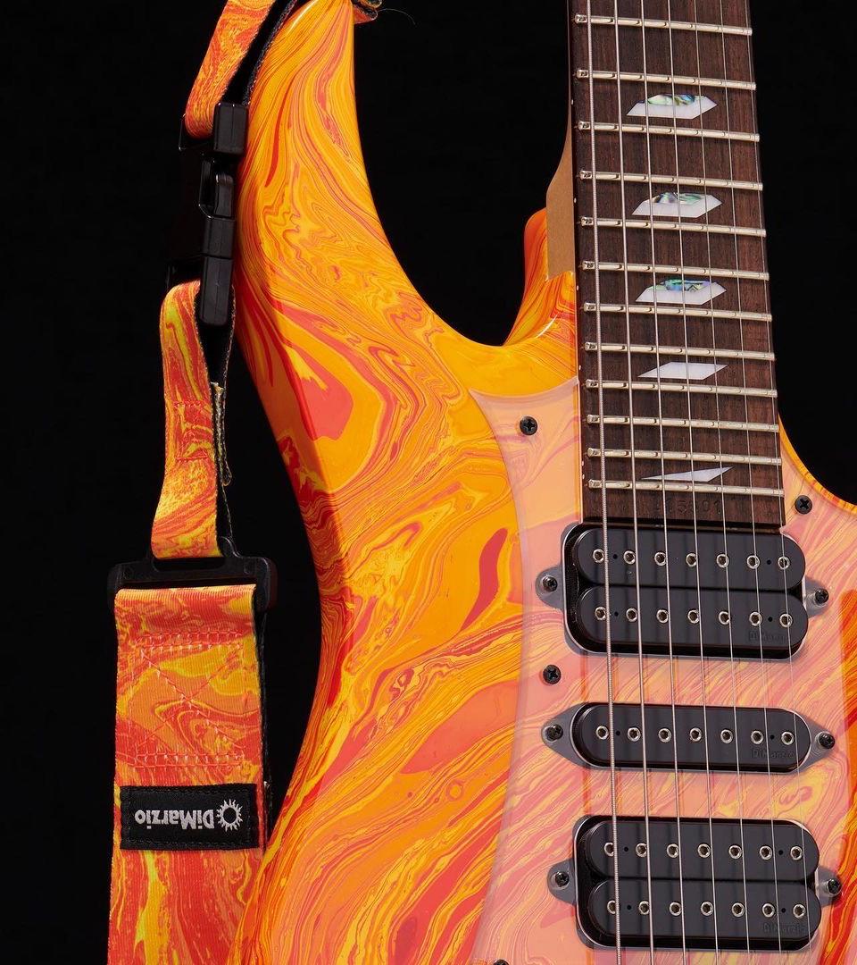 Steve Vai uses DiMarzio Orange Universe Cliplock®